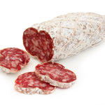 Salami with slices on a white background
